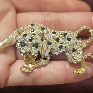 Elegant Gold and Black Panther Brooch